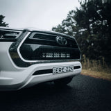 TRAILBAIT N80 Hilux Behind-Grille Light Bar